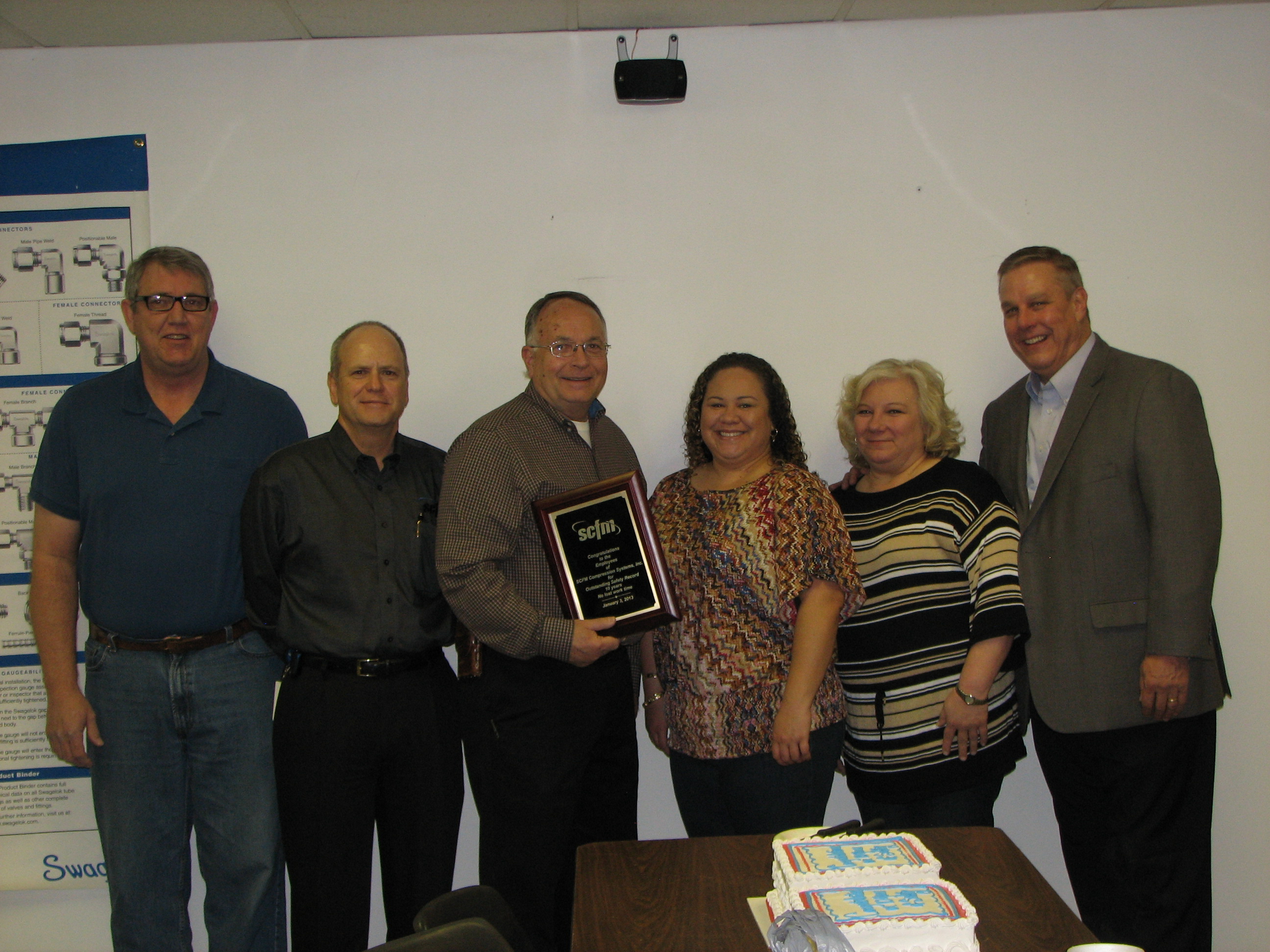 Our Safety Team, receiving an award from a representative from the state of Oklahoma