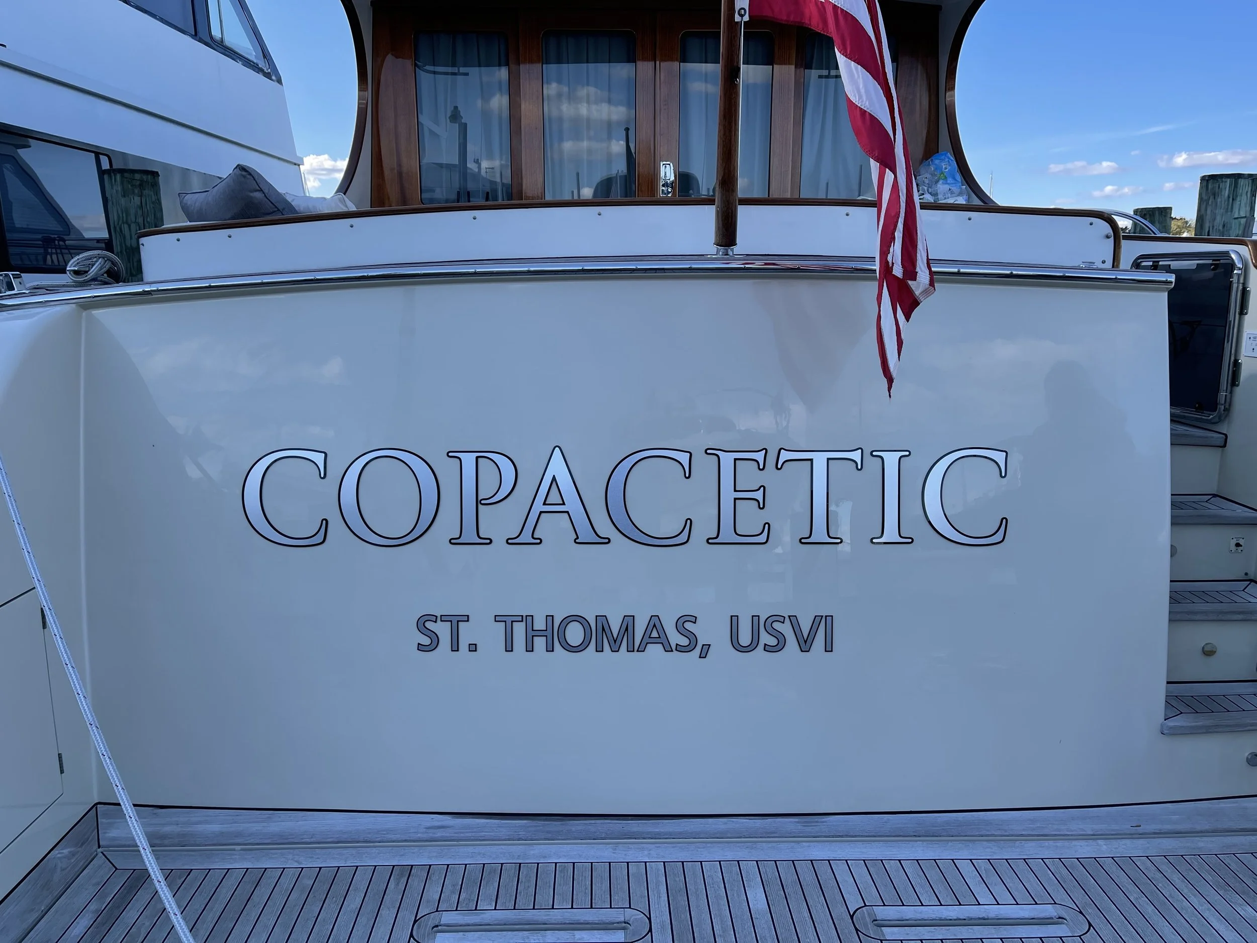 Raised acrylic letters with 22k brushed silver leaf vinyl