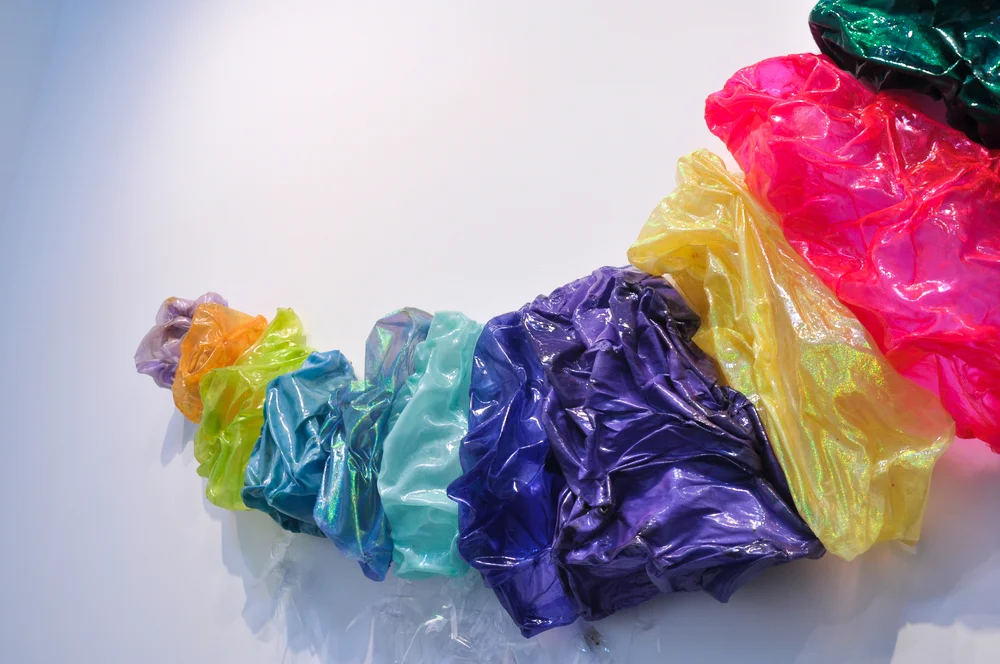 Made to Order Fabric with a Proprietary Chemical Treatment to Mimic Plastic.