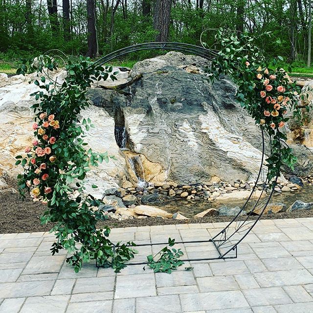 I love the use of this Circle arch with the flowers as part of the backdrop for a wedding. What are you using for your wedding? We got married at my church so we just had the alter flower. #askinstagram #circlearch #wedding #southerncharmplanning #weddingbackdrop #ceremony #florals #rosemontmanor