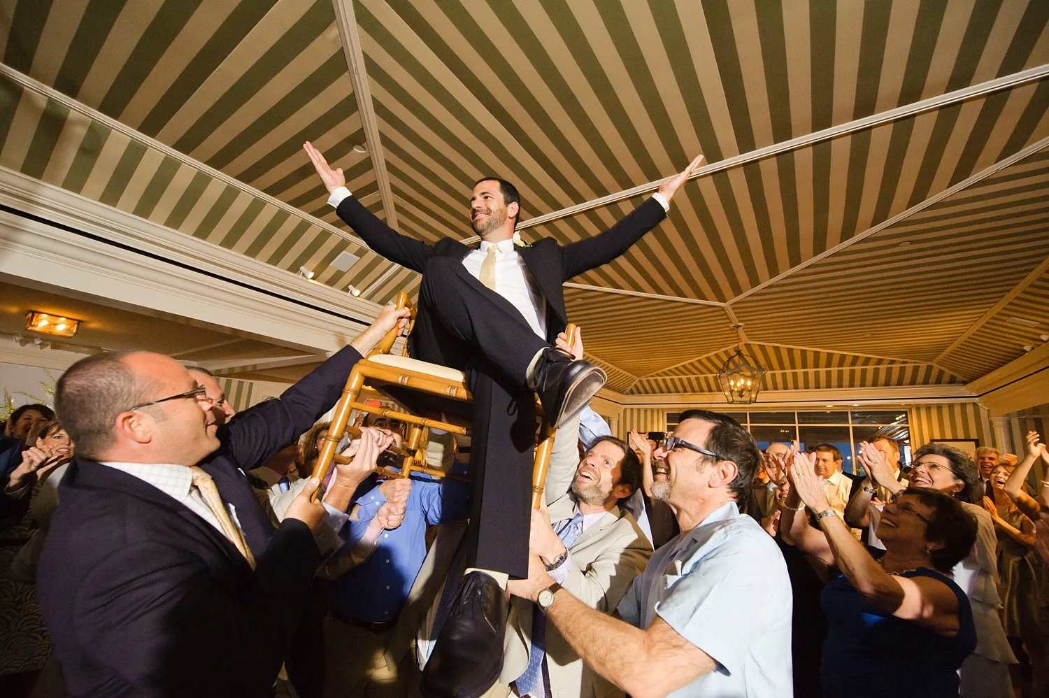 Groom Carried on Chair Saint Augustine Wedding Photography
