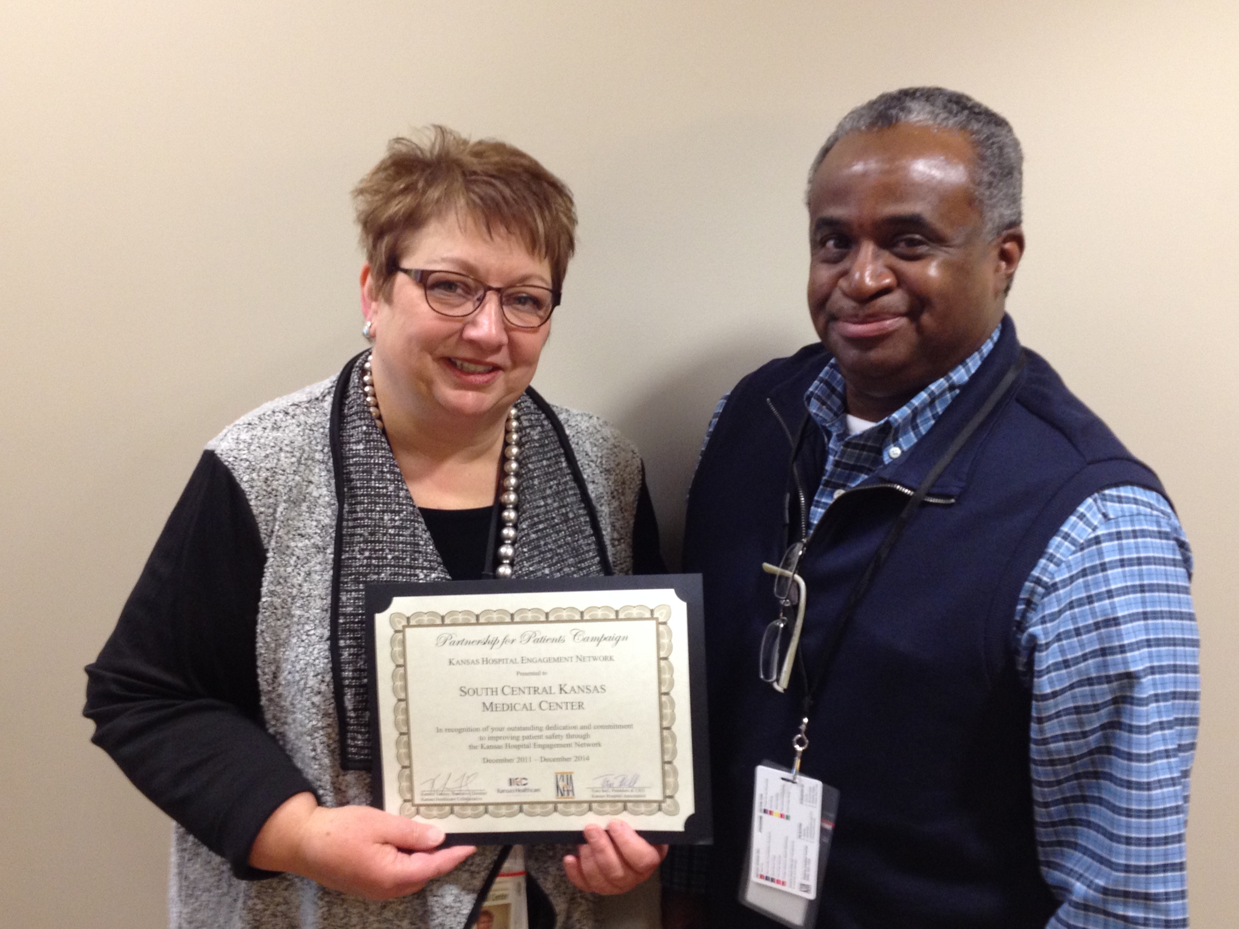 (Pictured): Virgil Watson, SCKMC's Chief Executive Officer and Jane Campbell, the hospital's Director of Hospital Quality and Risk Management, display the certificate presented by the Kansas Healthcare Collaborative for "outstanding dedication and commitment to improving patient safety through the Kansas Hospital Engagement Network."