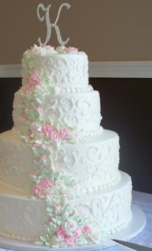 White Scrollwork with Pink Frosting Roses