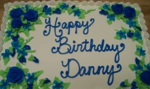 White Frosting with Blue Roses