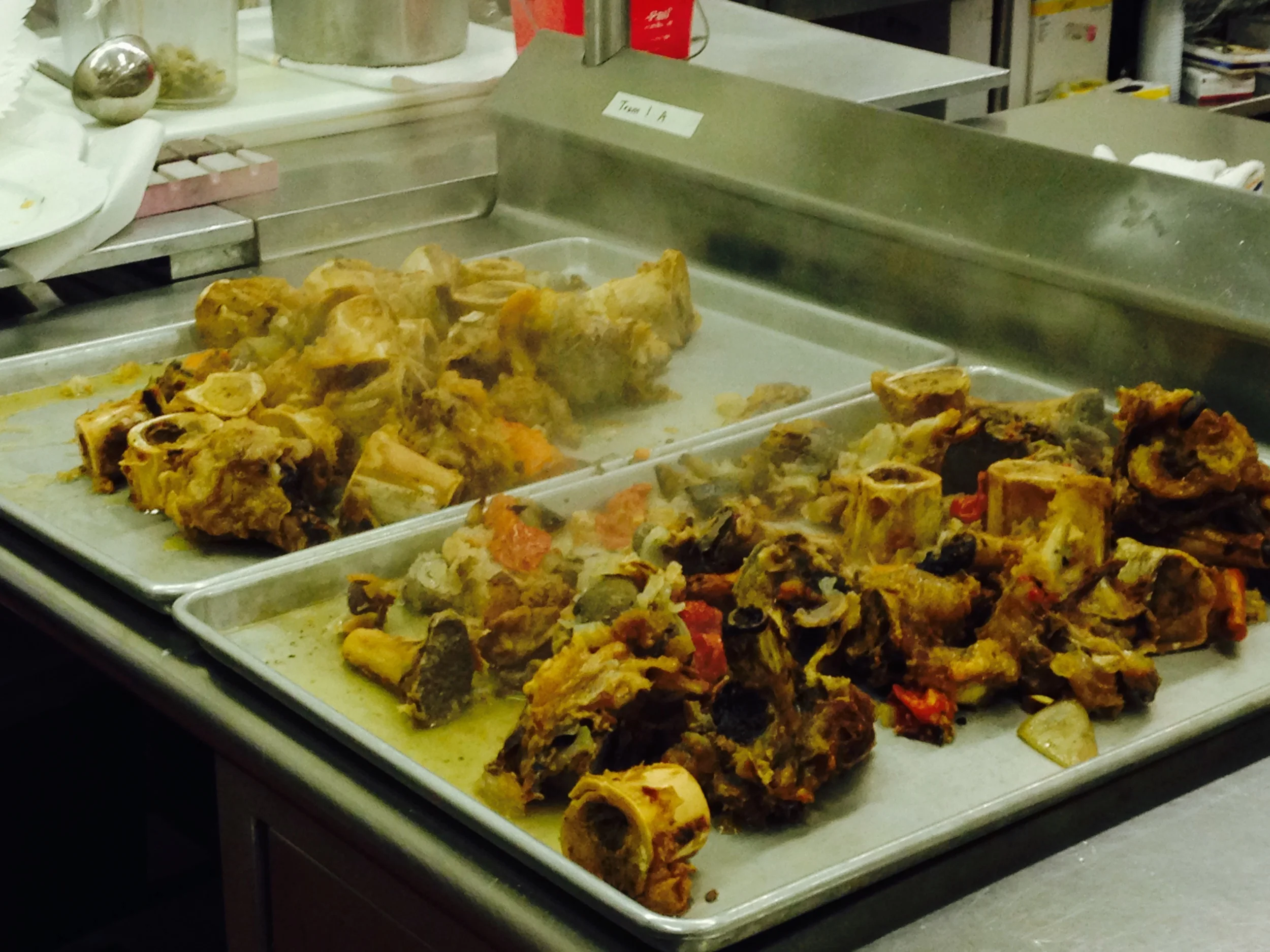 Veal knuckle bones were roasted for 3 hours, then simmered for 8—not as much time as they needed. These strained bones will be re-simmered in next class to extract even more gelatin for the stock.