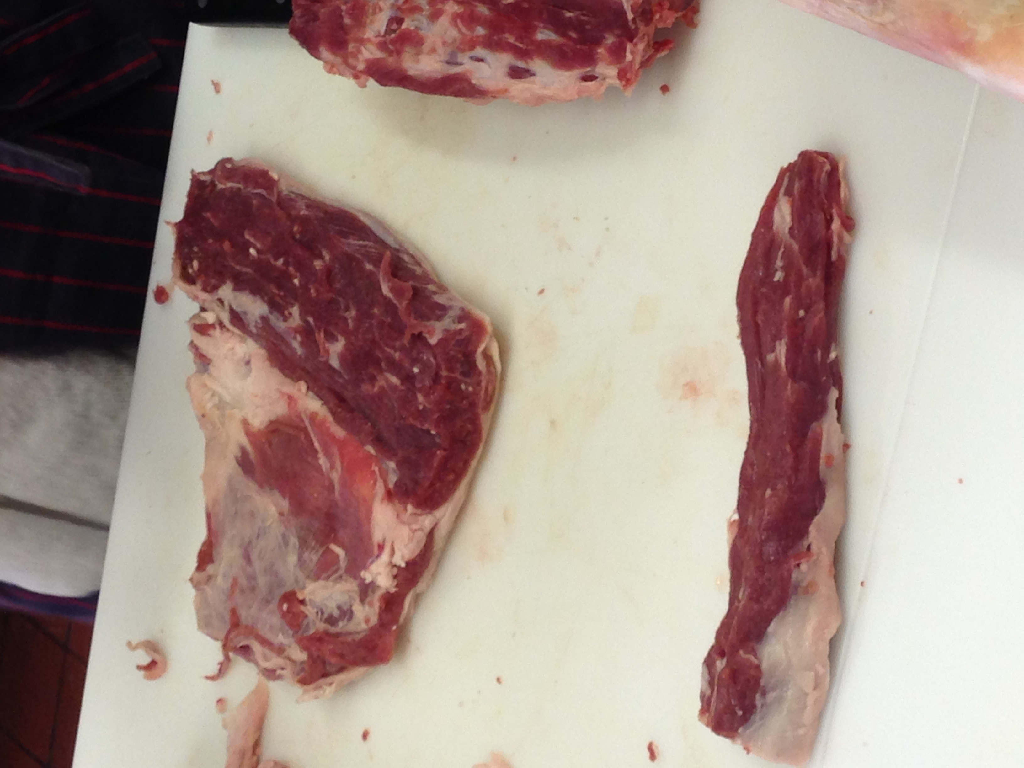 A lamb "Porchetta" —the loin with belly attached, and lamb tenderloin.