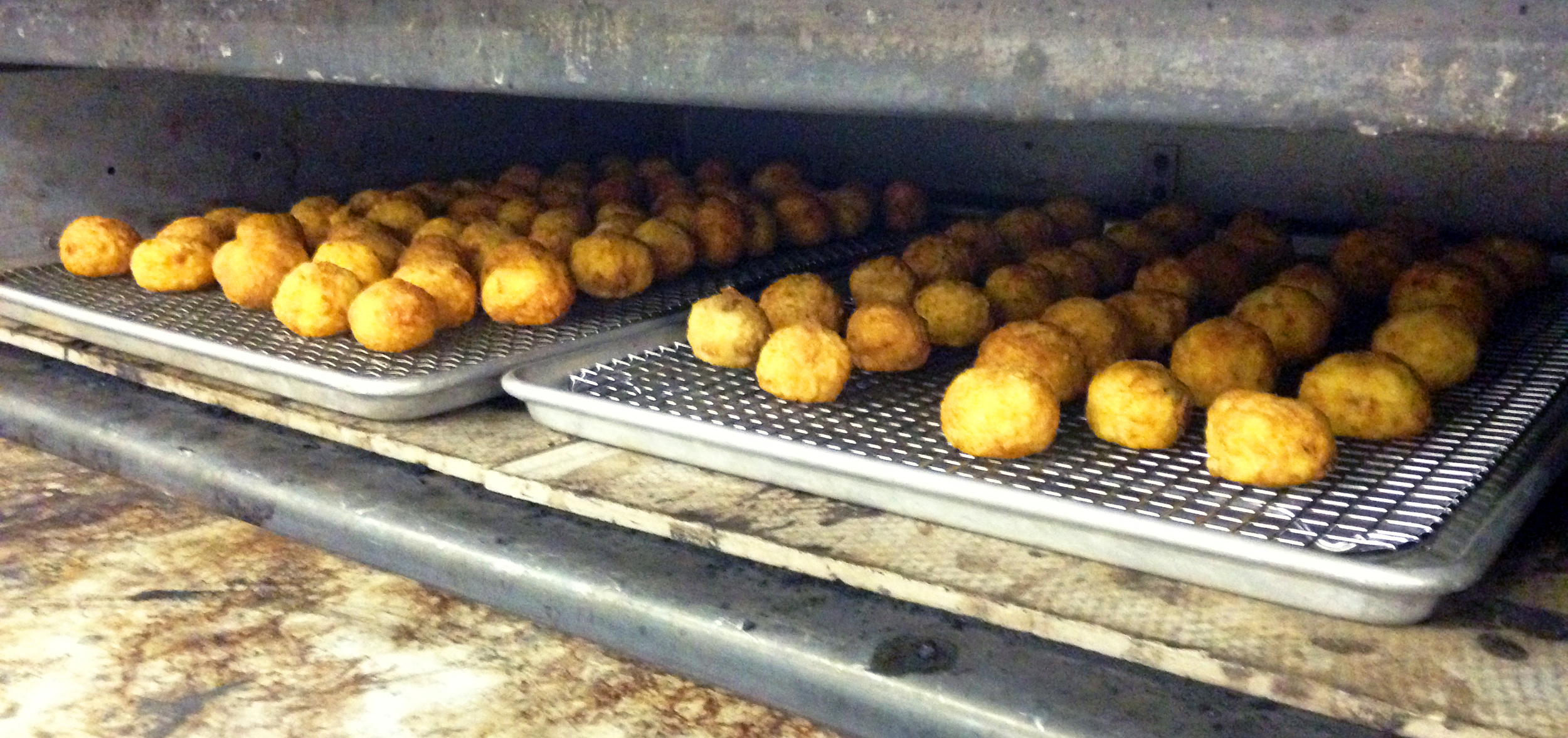 The fried arancini were kept warm in the deck oven before service.