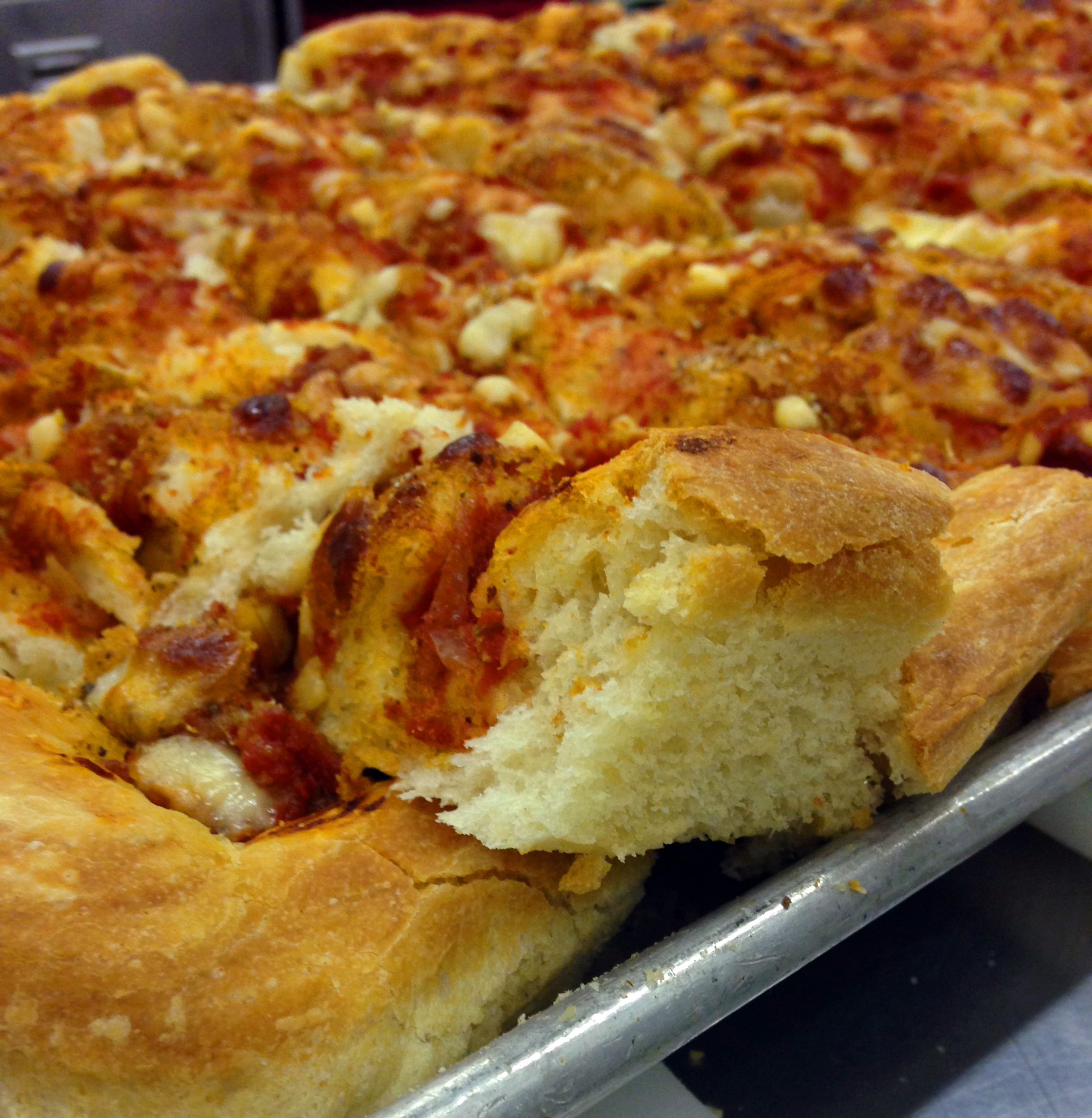The finished sfincione had a thick but light crust