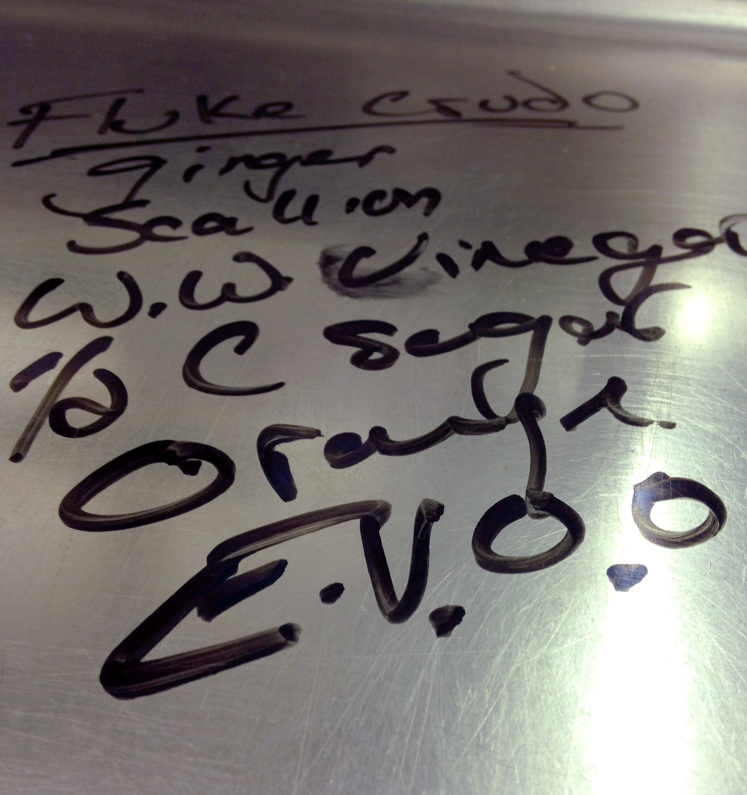 In lieu of recipes, chef Jeremy wrote out ingredients directly on our work bench