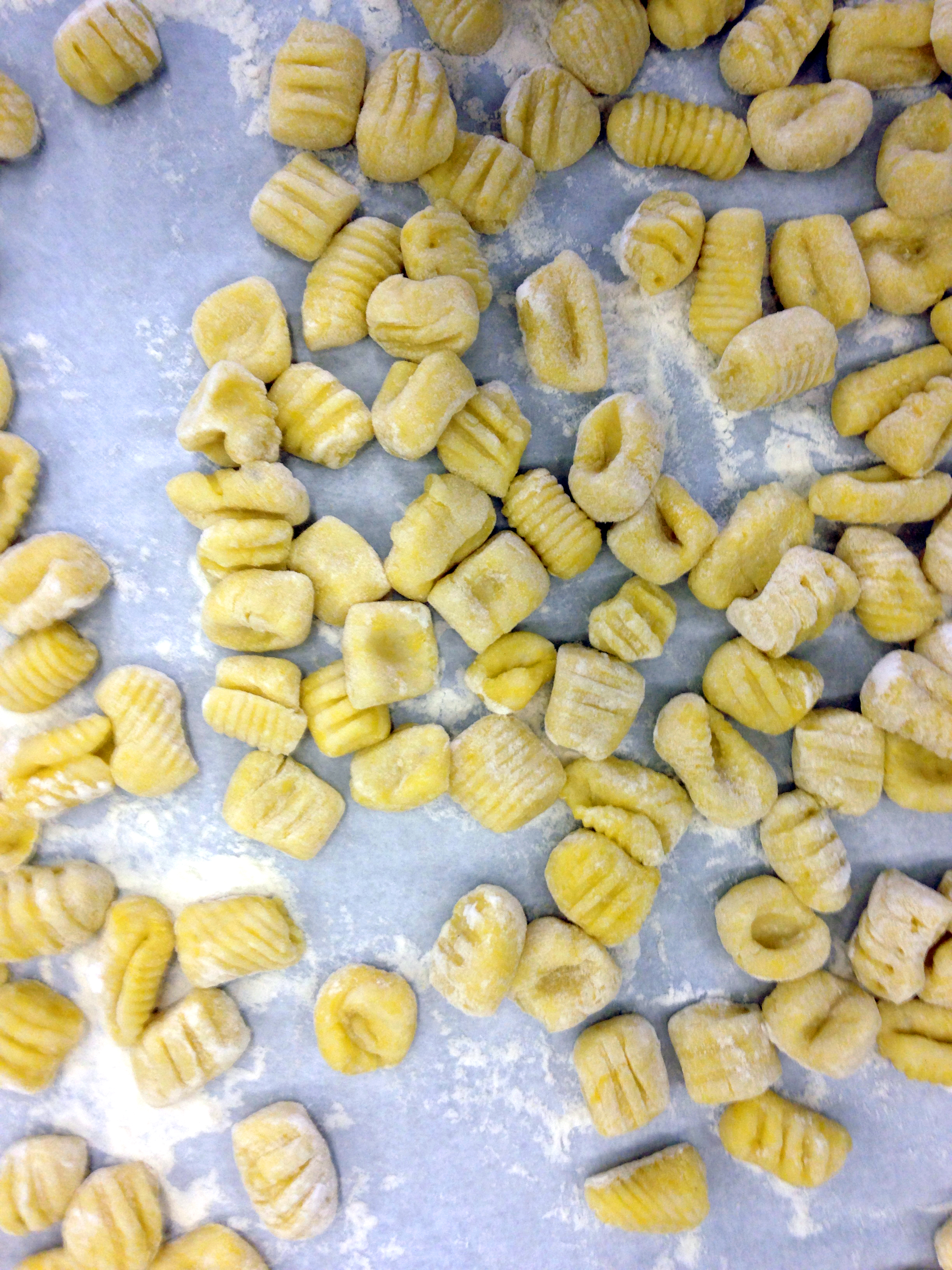 We tried a few different techniques for shaping and marking the gnocchi - with a fork, and a wooden pasta paddle