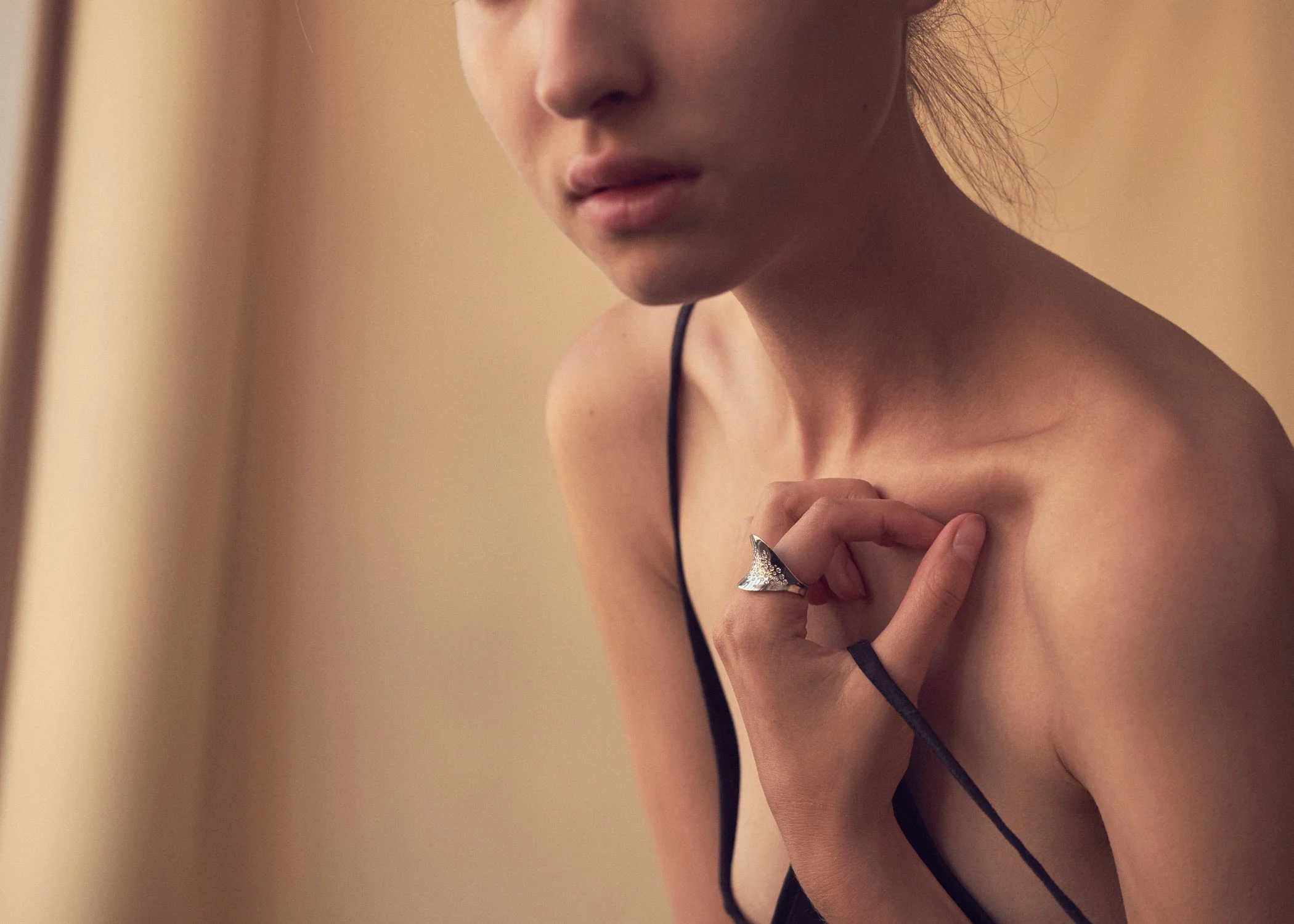 the Lyra-Galaxy ring, platinum with white diamond detail