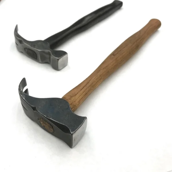 1045 iron and hickory carpenters claw-hammers, forged and filed, under the direction of Seth Gould, Penland School of Crafts, 2018