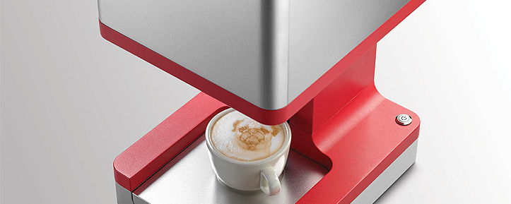 a few seconds later your coffee with a latte art or a personal message in the foam is ready