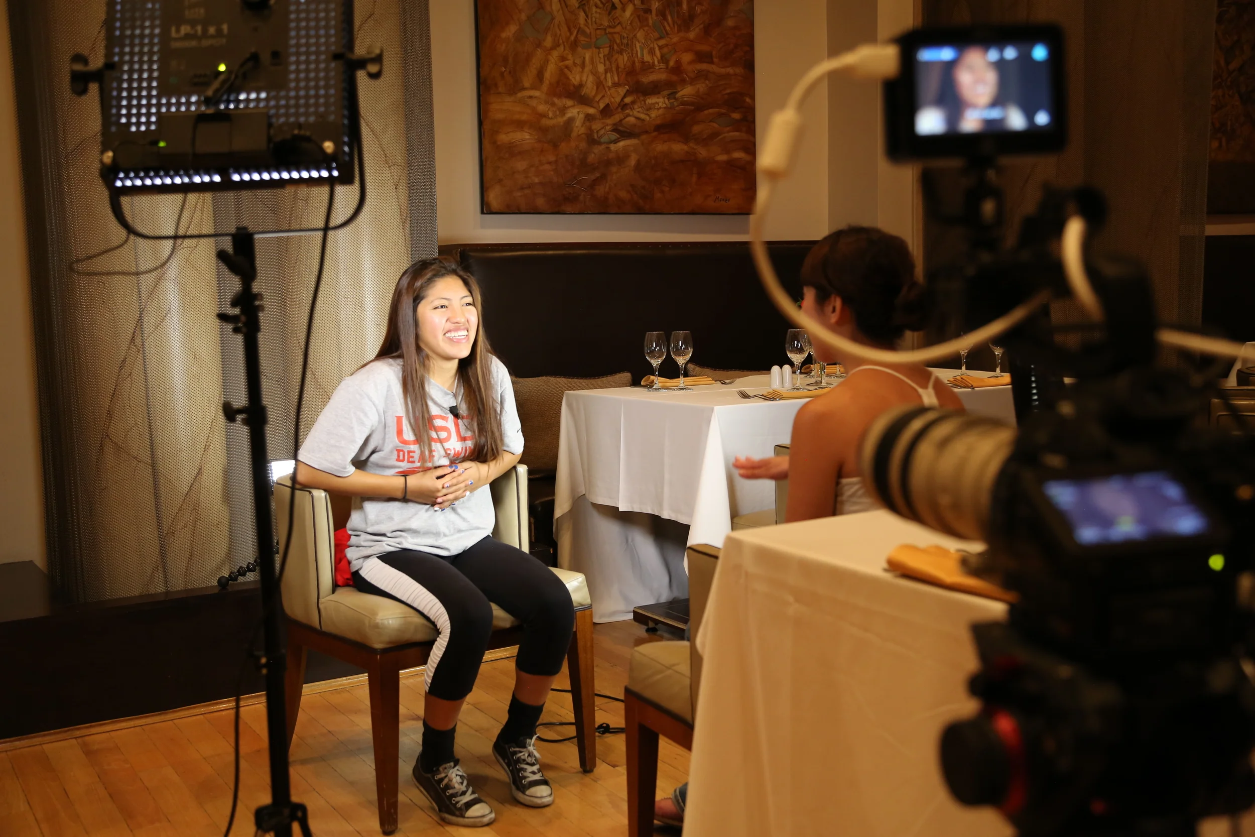 A behind-the-scenes photo of the documentary "Swimmer's Ear," directed by Amanda Salem & Stephen James Fell. Photo courtesy of Cambria Films.