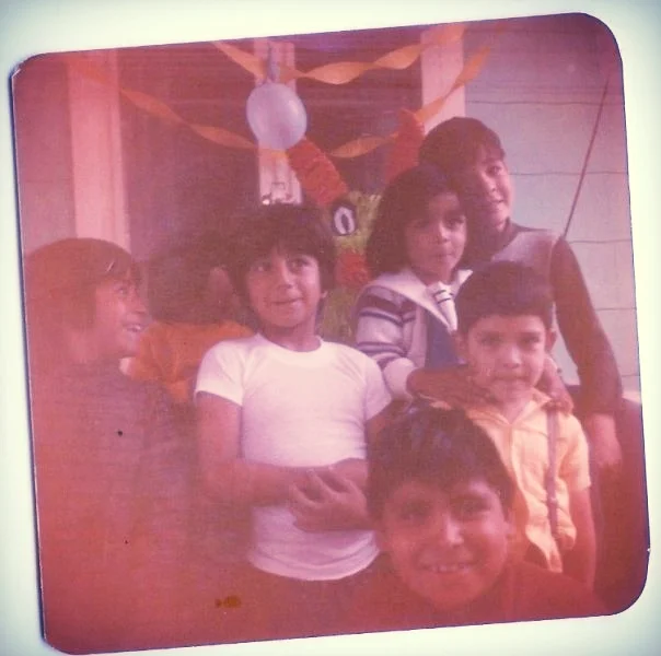 Paulie and his merry hand of cholo primos.