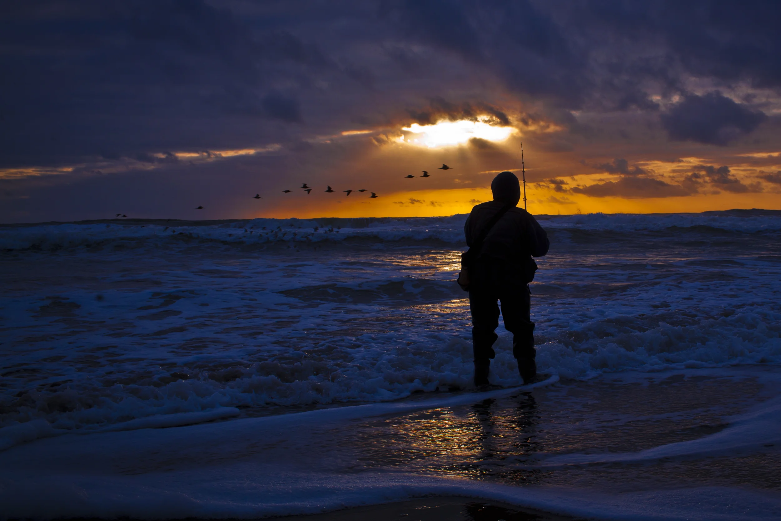 Surf fishing - Ocean Beach, San Francisco, CA
