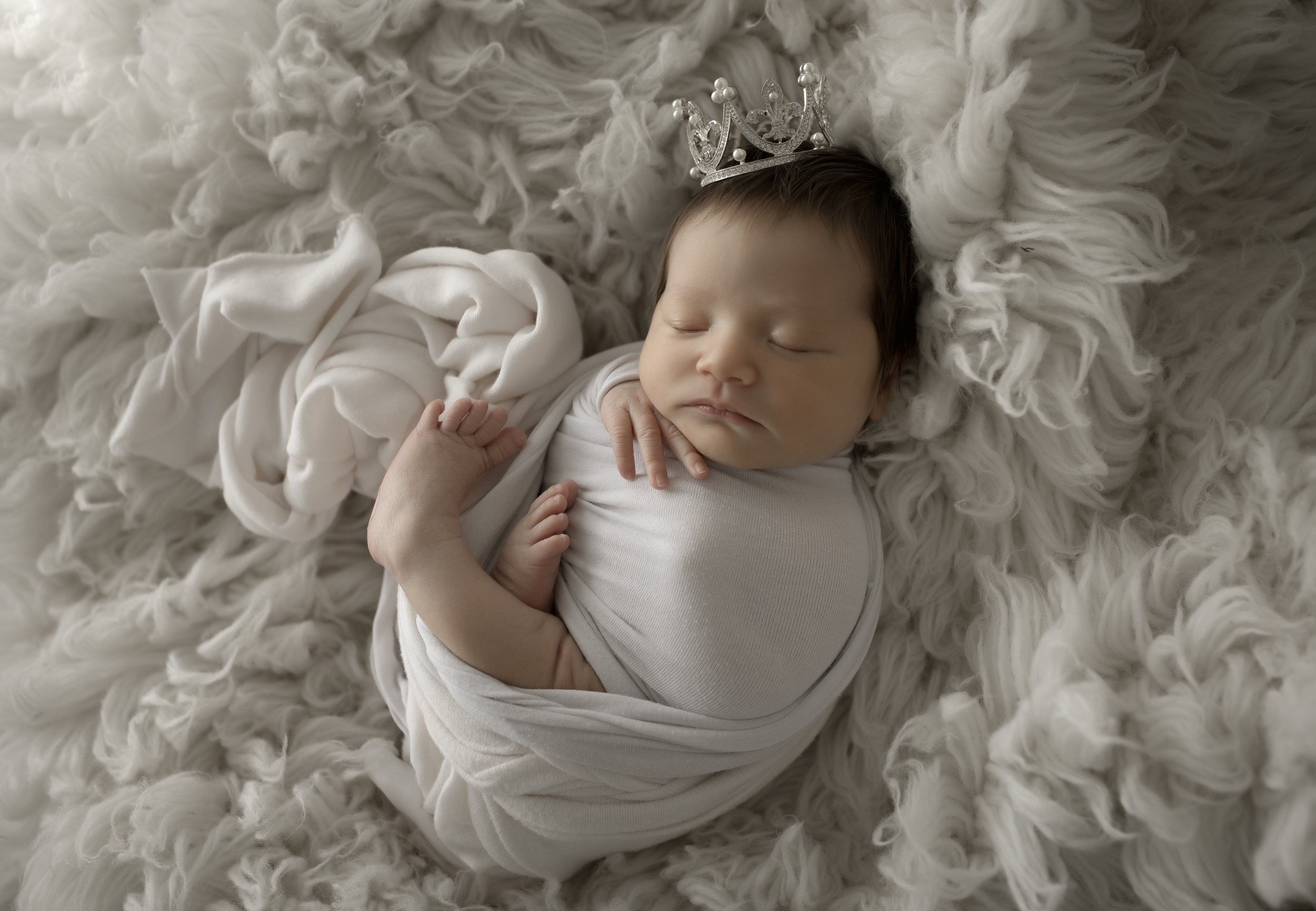 Newborn baby with crown