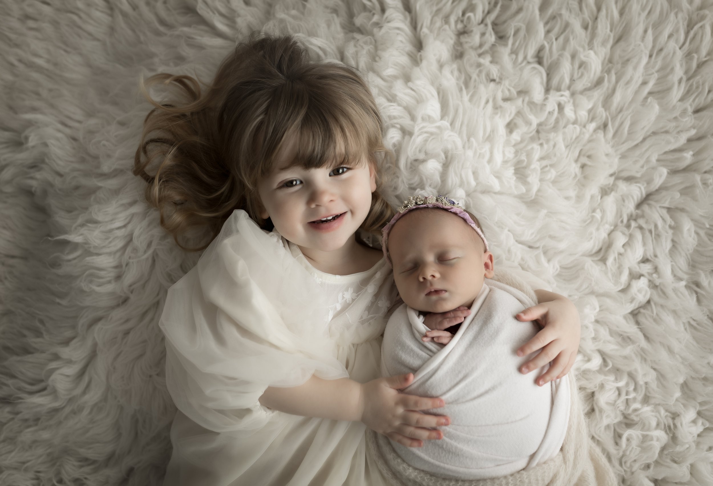Newborn+and+sibling+photographs+cheshire