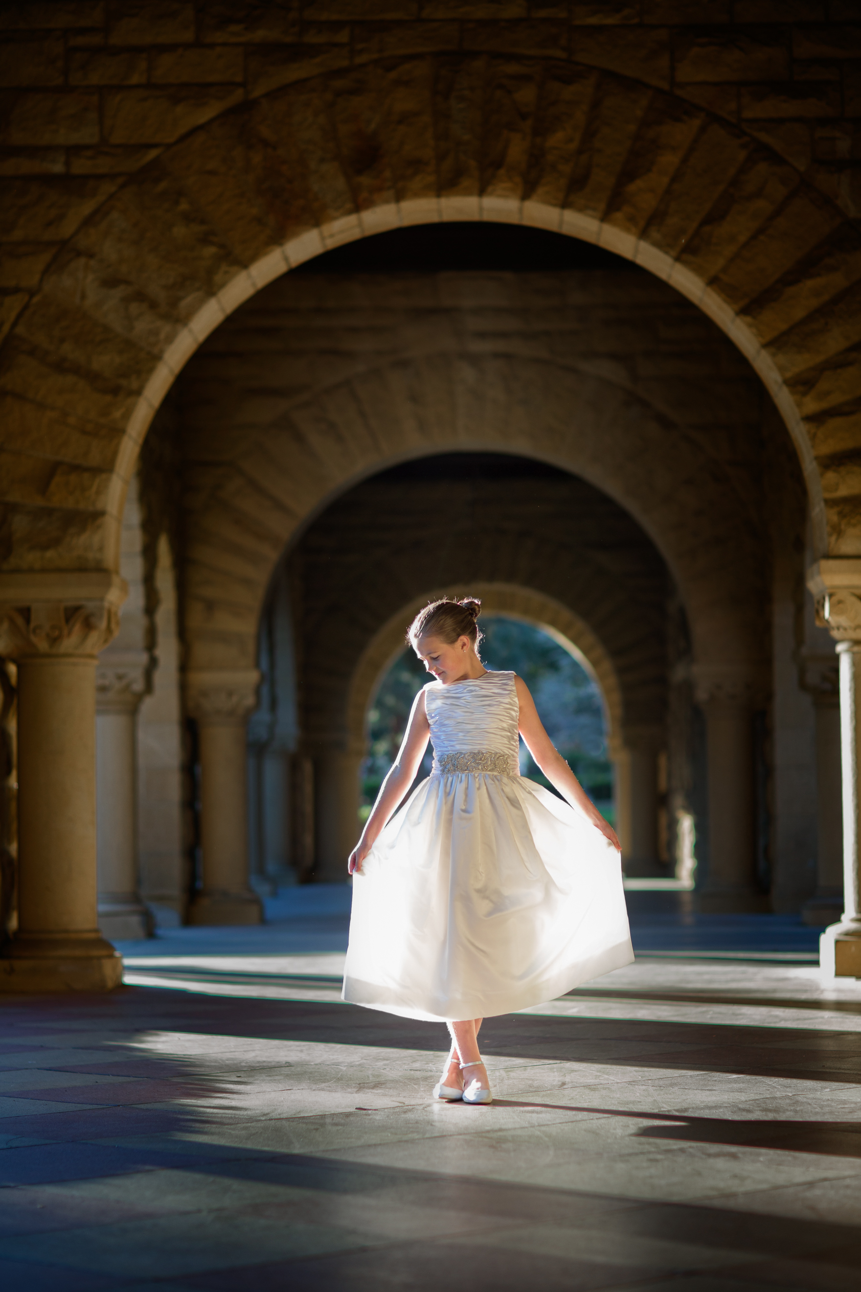 first communion photo under arch by photographer Abel Sanchez.jpg