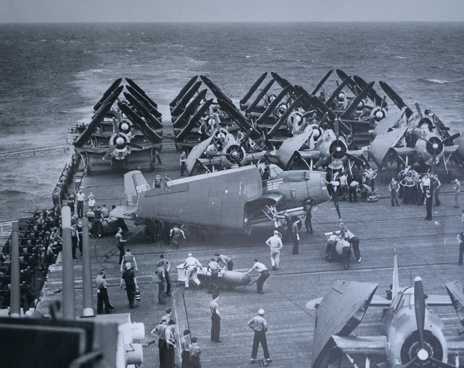 Busy preparation for a combat mission on the deck of the USS Hornet, the carrier Ken's squadron was assigned to.