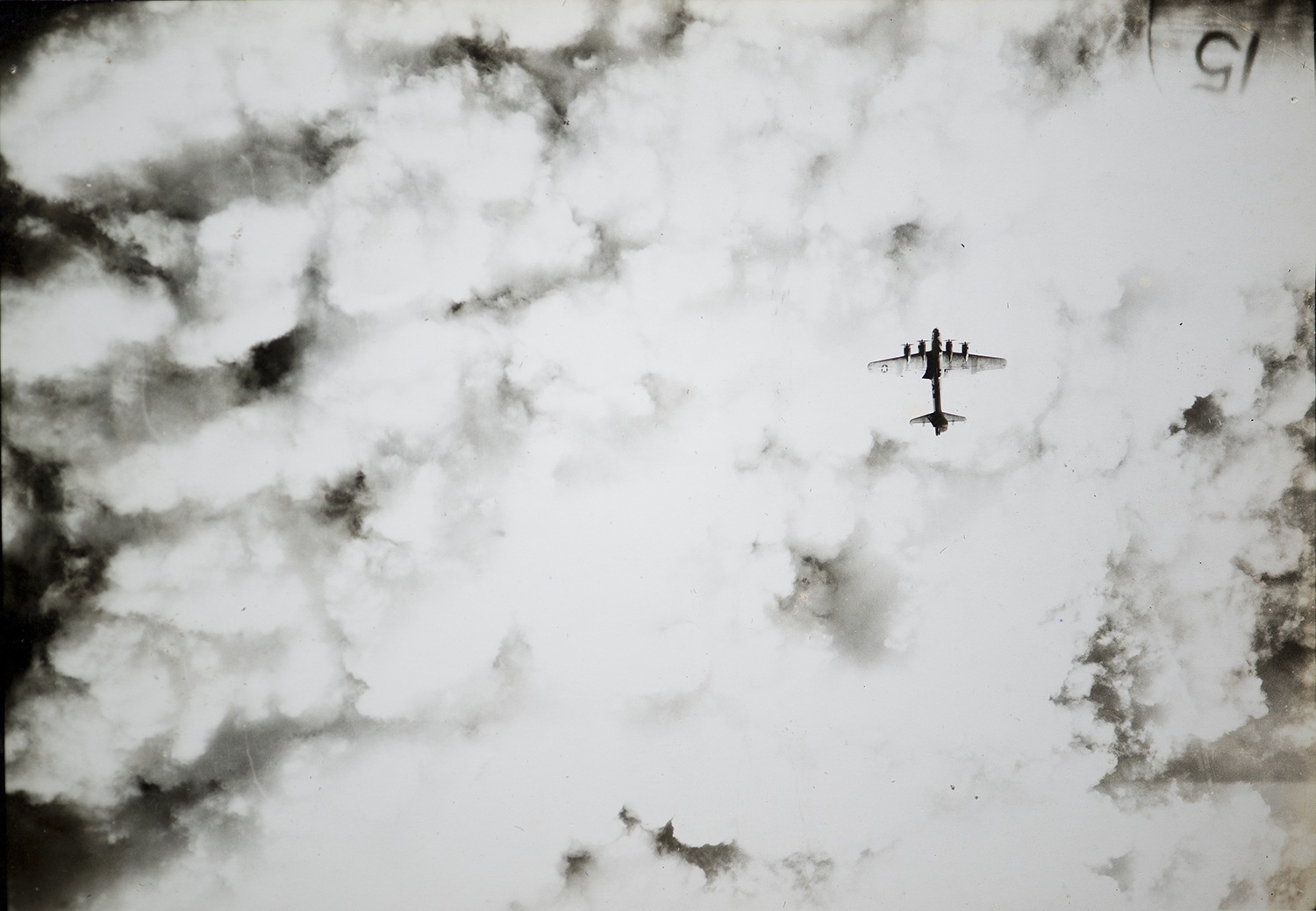 34th Bomb Group B-17 flying over cloud cover in Berlin