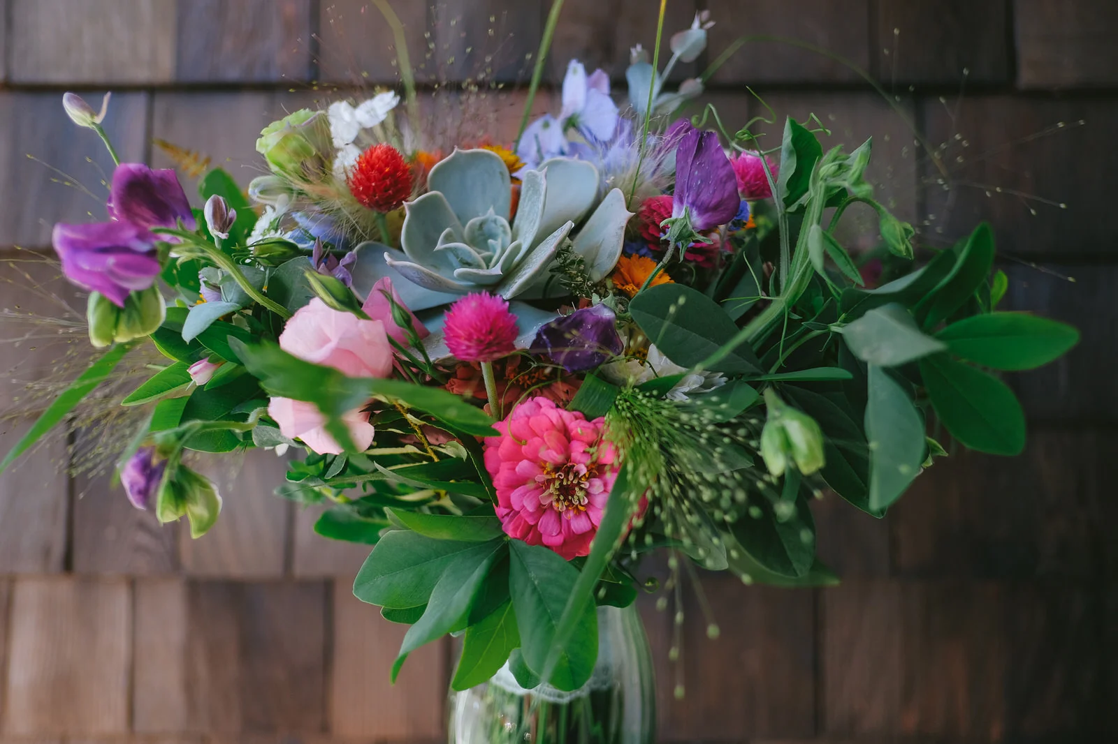 Although not tied to Sara & Alek’s visit, this bouquet is another example of what Denise is able to craft. These blooms were picked mid-September. The gallery below offers a larger selection of photos captured at the same wedding.