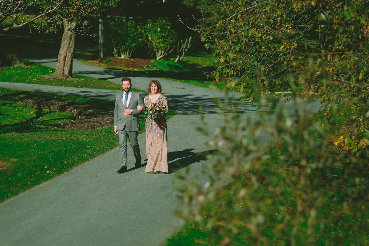  A fall wedding at Sullivan's Pond in Dartmouth, Nova Scotia, followed by a backyard reception. Formal photographs along the Dartmouth Waterfront by Evan McMaster, a Halifax based Wedding Photographer. 