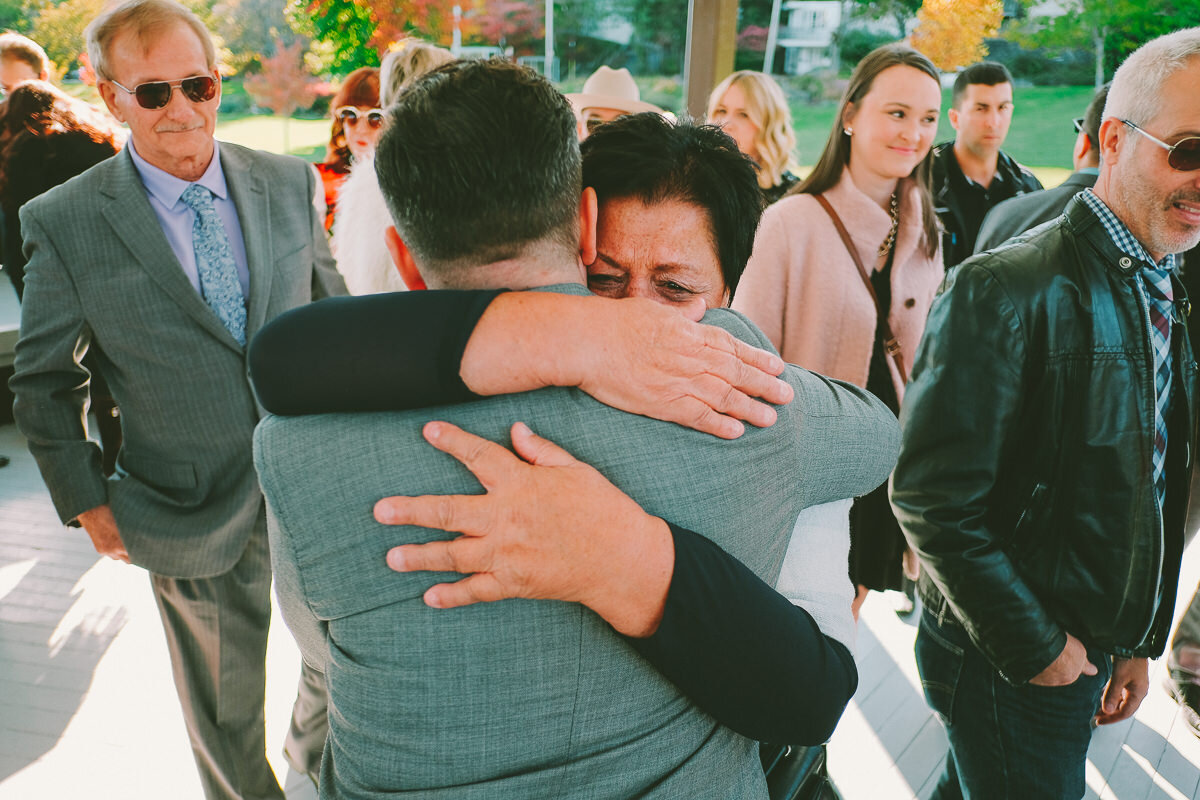  A fall wedding at Sullivan's Pond in Dartmouth, Nova Scotia, followed by a backyard reception. Formal photographs along the Dartmouth Waterfront by Evan McMaster, a Halifax based Wedding Photographer. 