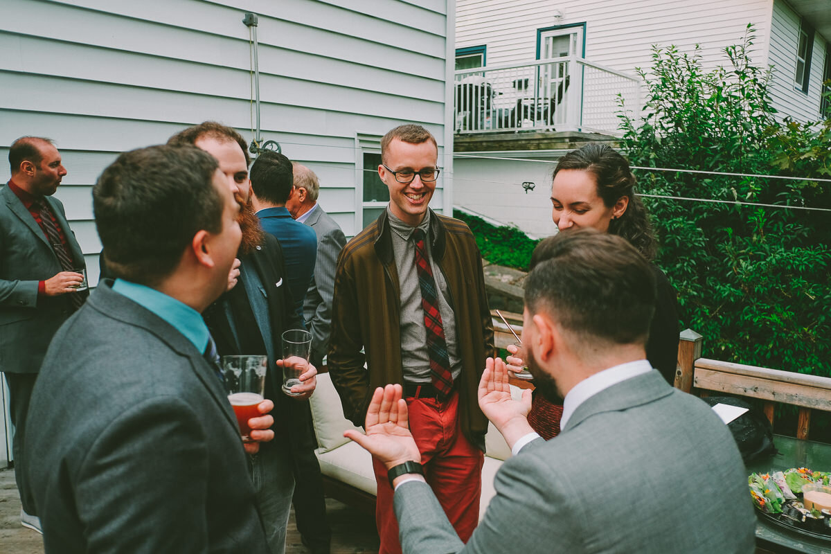  A fall wedding at Sullivan's Pond in Dartmouth, Nova Scotia, followed by a backyard reception. Formal photographs along the Dartmouth Waterfront by Evan McMaster, a Halifax based Wedding Photographer. 