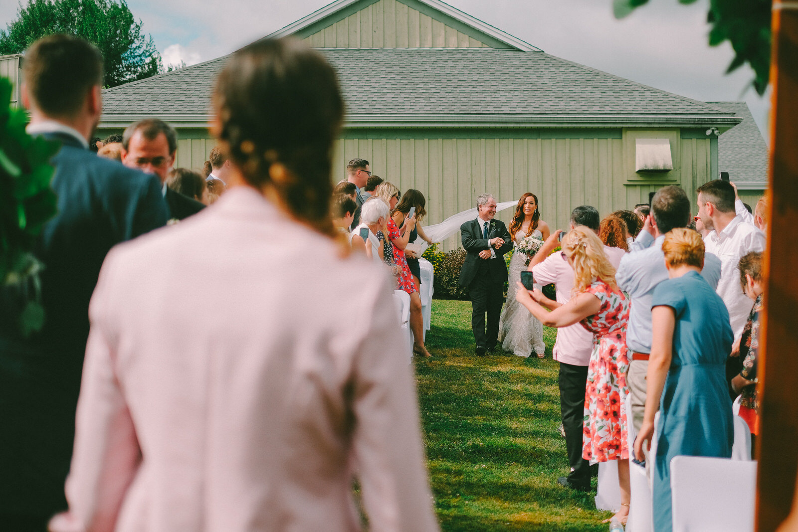  A lovely mid-summer wedding at Sainte-Famille Wines Ltd, located just outside of Windsor Nova Scoita. Candid wedding photographs captured by Halifax based photographer Evan McMaster. 