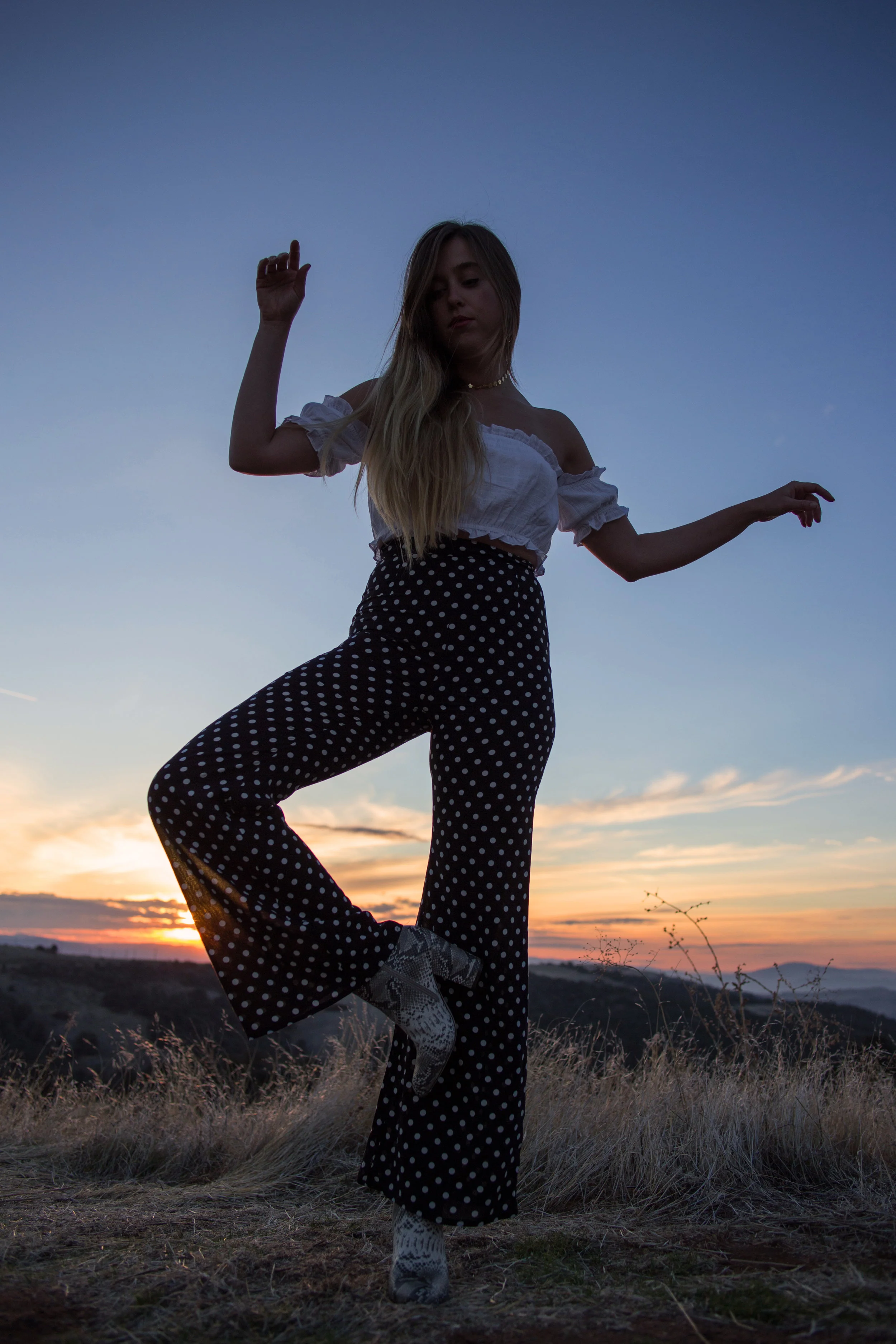 AstroBandit_Blackwater_Matisse_WildHoney_BlackPolkaDotPants_WhiteOffTheShoulderTop_SnakeskinBoots_8.jpg