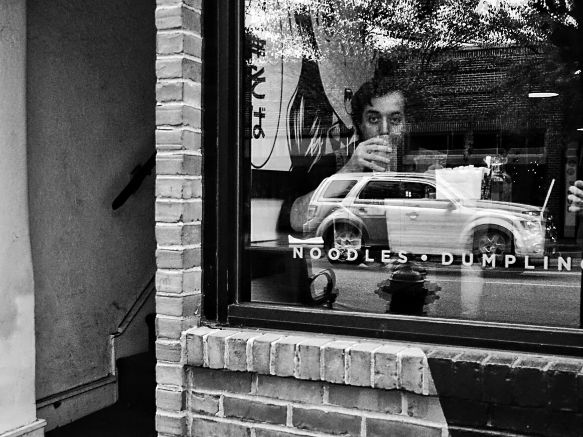 Eye contact through a window.