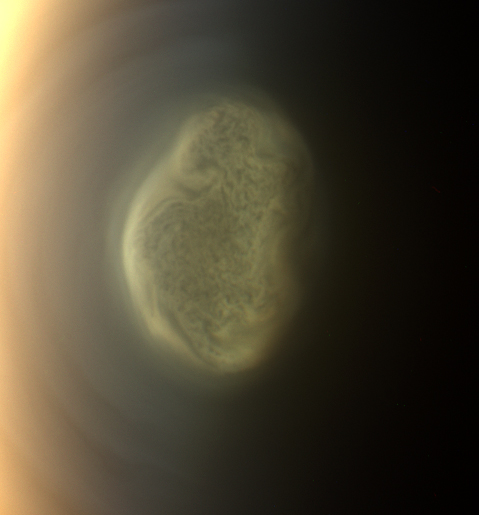 This 2012 close-up offers an early snapshot of the changes taking place at Titan’s south pole. Cassini’s camera spotted this impressive cloud hovering at an altitude of about 186 miles (300 kilometers). Cassini’s thermal infrared instrument has now detected a massive ice cloud below it. - Image credit: NASA/JPL-Caltech/Space Science Institute