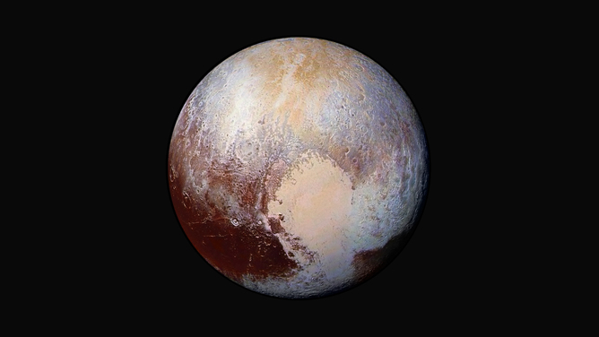 Could Pluto hide liquid water far beneath its surface? - Image Credit: NASA