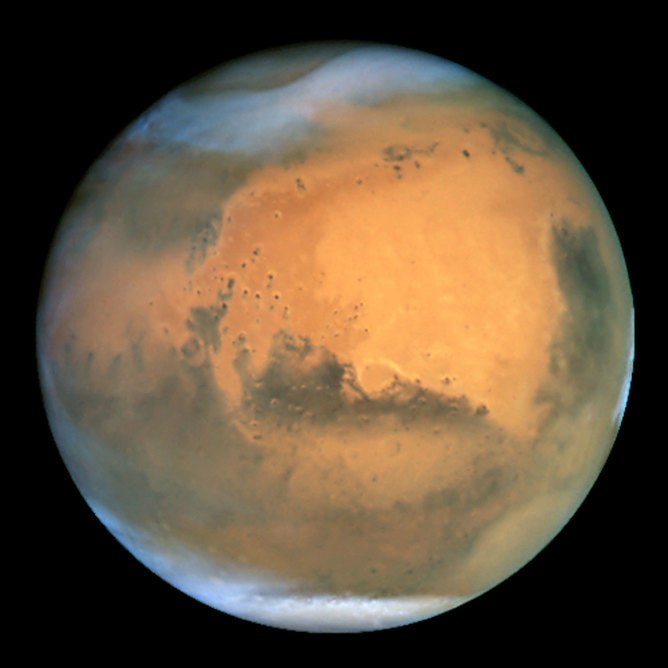 Mars seen by Hubble. - Image Credits: NASA and The Hubble Heritage Team/wikimedia