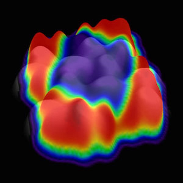 3D representation of a scanning tunnelling microscopy image of a nano-island composed of twelve organic semiconducting molecules on a thin sodium chloride film. Electrons of boundary (red) and centre (purple) molecules behave dramatically differently. - Image Credit: Monash University