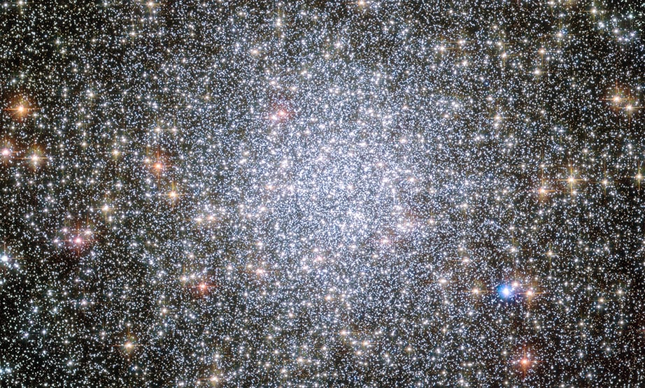 Globular star clusters like this one, 47 Tucanae, might be excellent places to search for interstellar civilizations. Their crowded nature means intelligent life at our stage of technological advancement could send probes to the nearest stars. - Image Credit: NASA, ESA, and the Hubble Heritage Team
