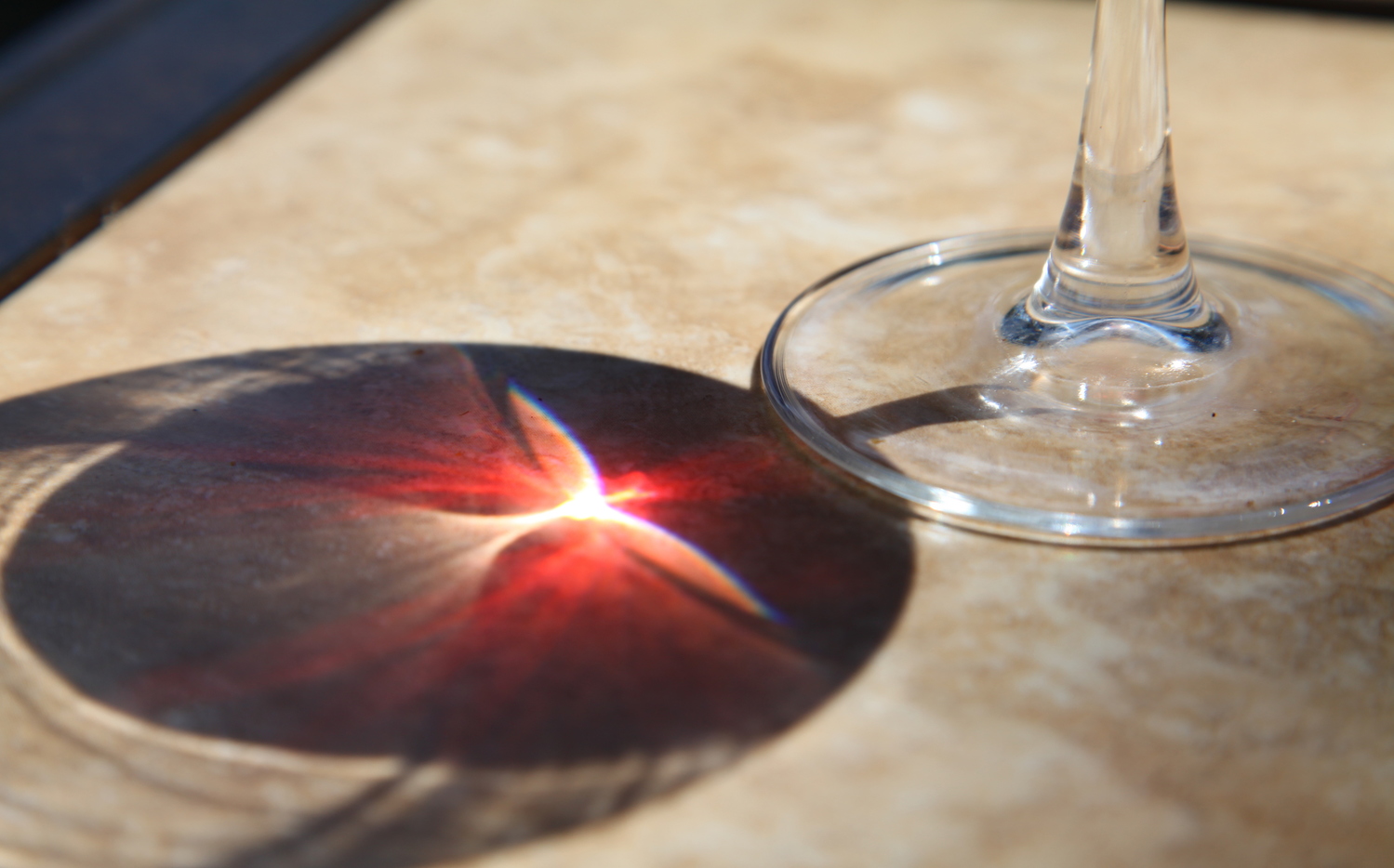 Note the pattern of sunlight through the wine glass - Image Credit: John Melancon/Flickr