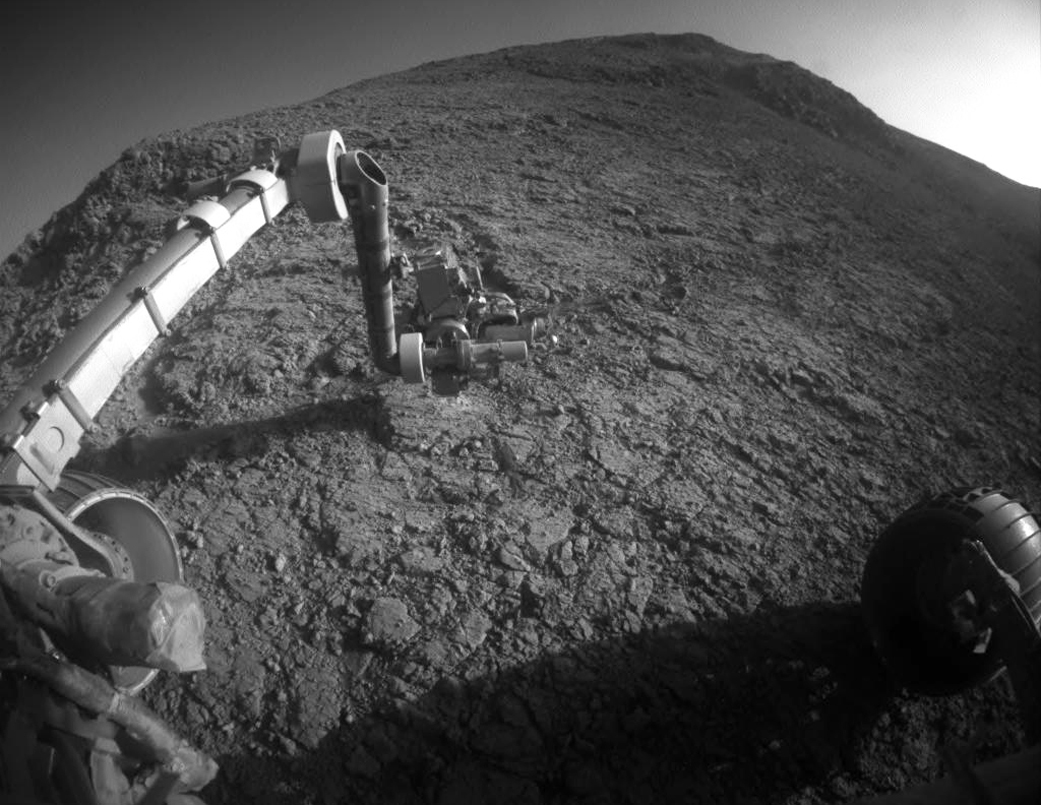 The target beneath the tool turret at the end of the rover's robotic arm in this image from NASA's Mars Exploration Rover Opportunity is "Private John Potts." It lies high on the southern side of "Marathon Valley," which slices through the western rim of Endeavour Crater. – Image Credit: NASA/JPL-Caltech
