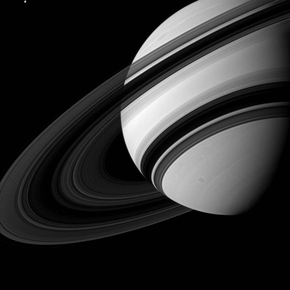 Saturn's B ring is the most opaque of the main rings, appearing almost black in this Cassini image taken from the unlit side of the ringplane. – Image Credits: NASA/JPL-Caltech/Space Science Institute