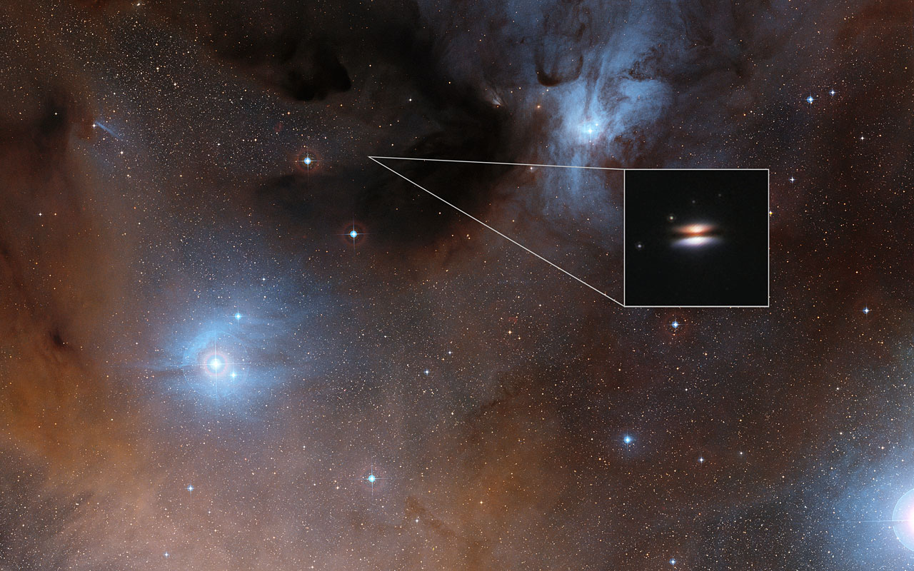 The Flying Saucer protoplanetary disc around 2MASS J16281370-2431391 - Image Credit: Digitized Sky Survey 2/NASA/ESA