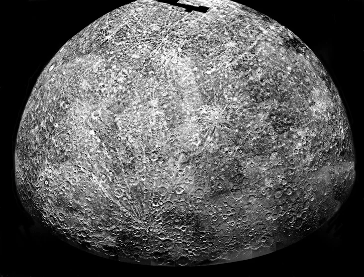 A photomosaic of images collected by Mariner 10 as it flew past Mercury. But was there another planet nearby? - Image Credit: NASA