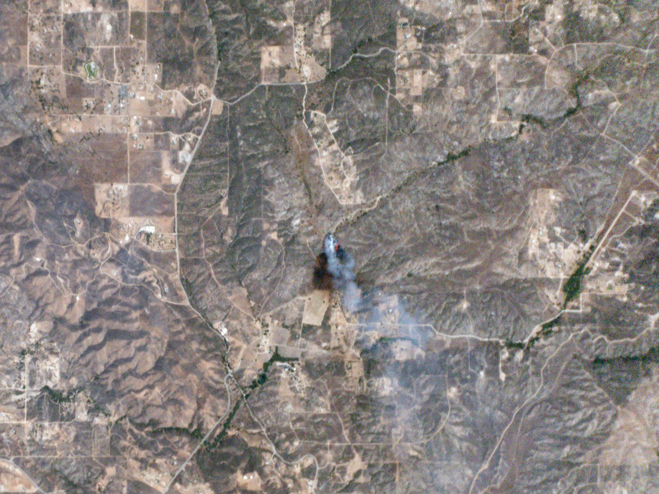 Planet Labs’ Dove nanosatellites captured this image of the Sabina wildfire in Riverside County, California, on July 23, 2014, just 10 minutes after it was reported. The photo reveals the fire’s size, the path it had burned, the wind direction, and its exact location. – Image Credits: Planet Labs Inc.