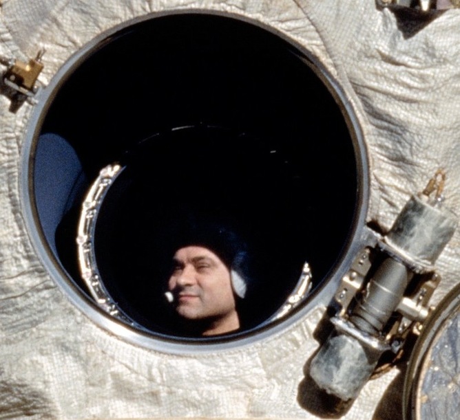 Cosmonaut Polyakov, who holds the record for longest time spent in space with 438 days, looks out Mir’s window. - Image Credit: NASA