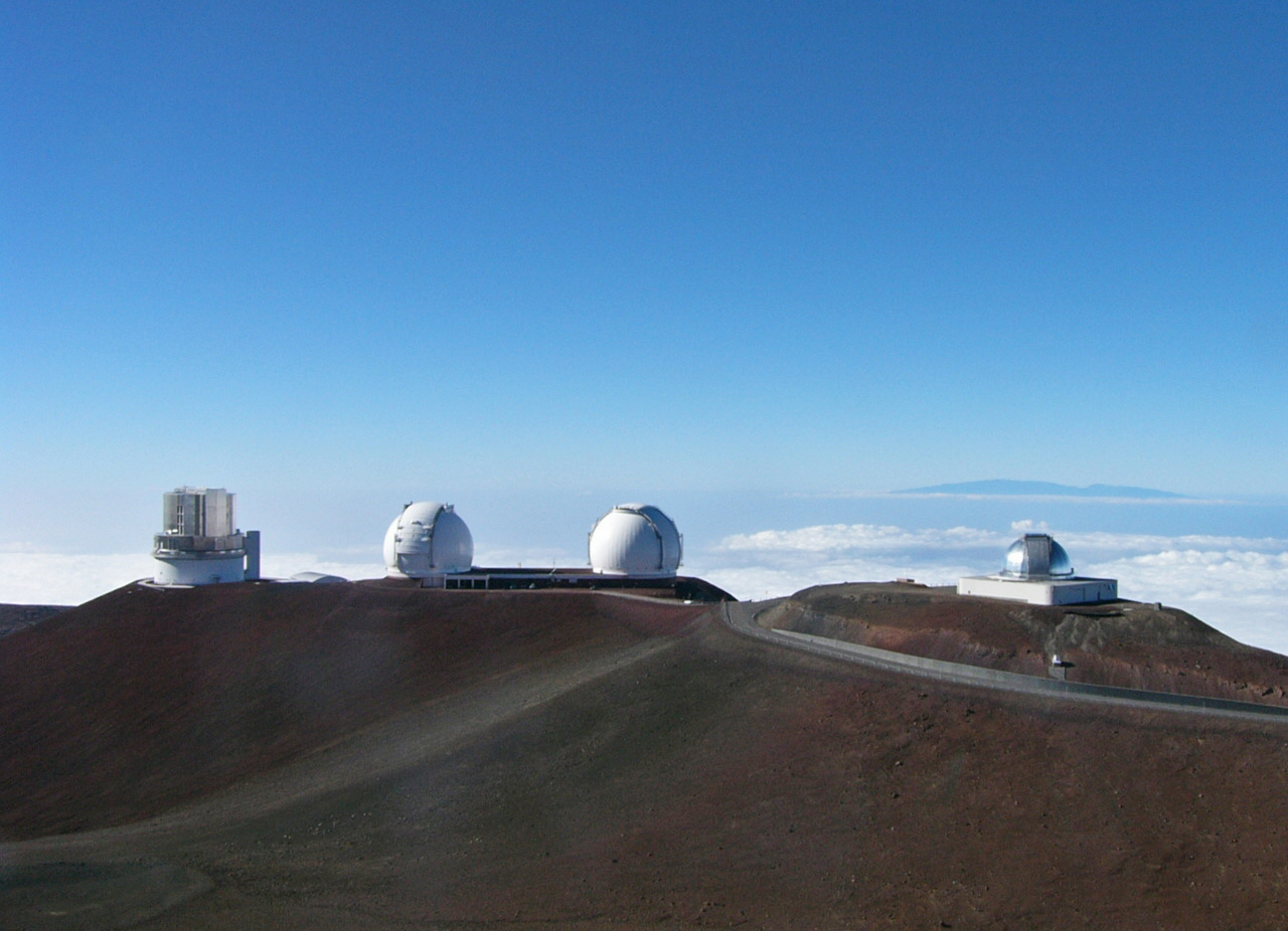 A needle in a haystack? Pan Starrs telescope is scanning billions of galaxies to find the black holes emitting gravitational waves - Image Credit: Sasquatch/WikimediaCommons
