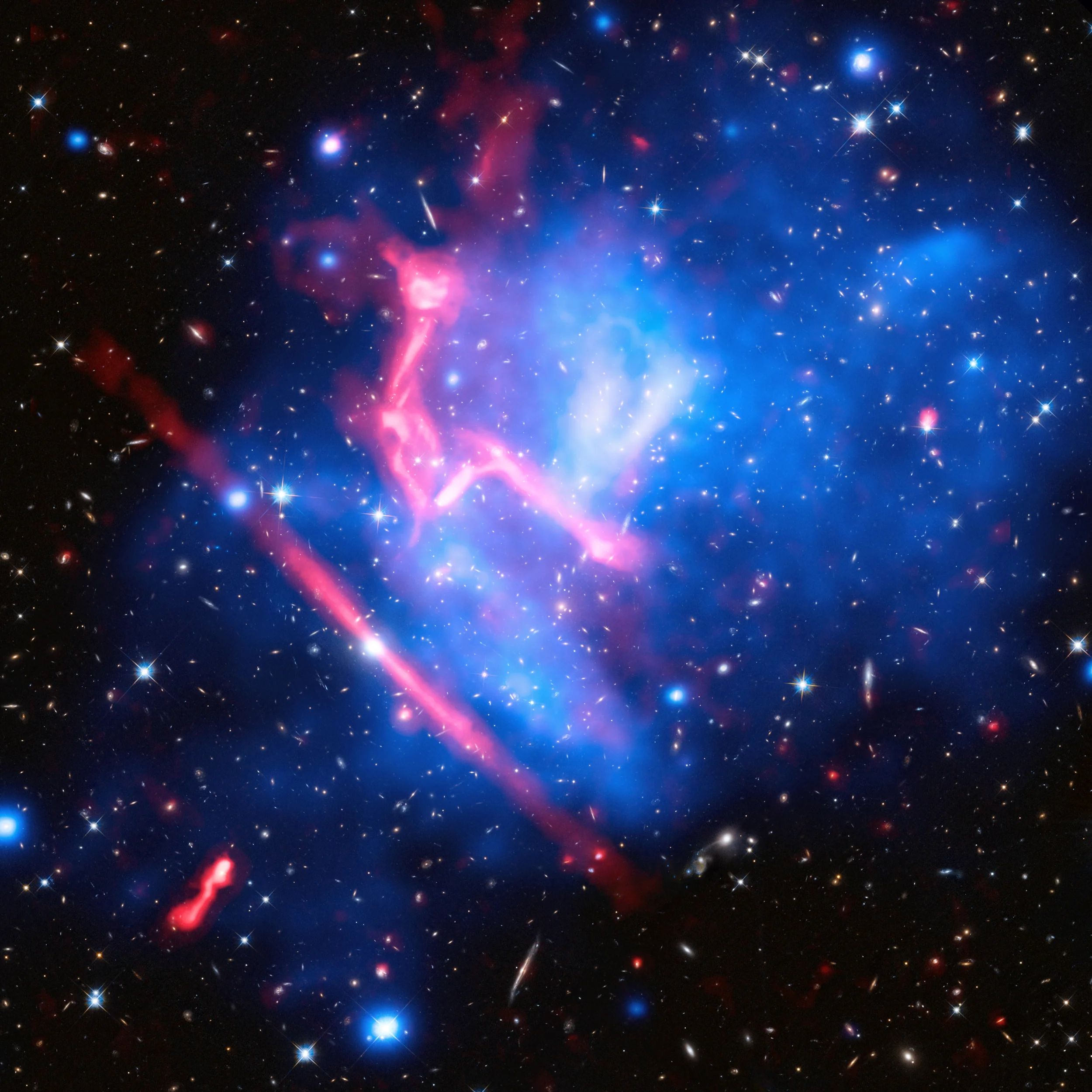 Frontier Fields galaxy cluster MACS J0717 - Image Credits: X-ray: NASA/CXC/SAO/van Weeren et al.; Optical: NASA/STScI; Radio: NSF/NRAO/VLA