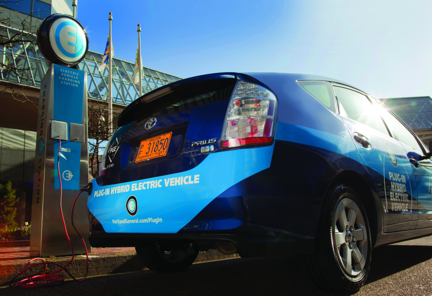 Plug-in electric vehicles are cleaner, but because volumes are relatively low, their impact on emissions reductions is much lower than any gains in the giant gasoline-engine market. - Image Credit: portlandgeneralelectric/flickr , CC BY-ND