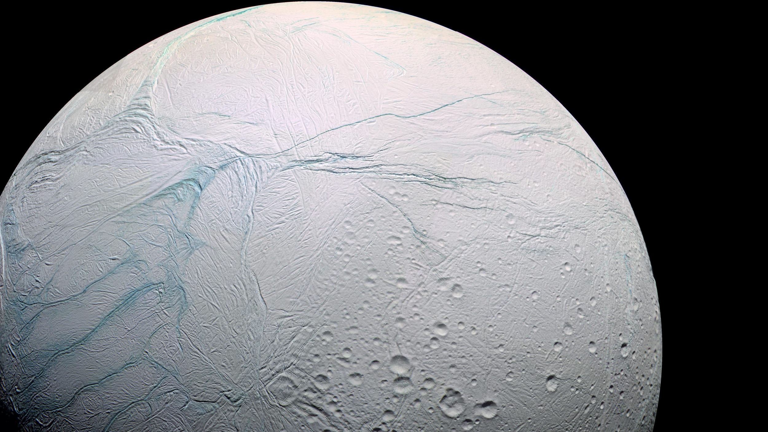 Enceladus, with its warm internal ocean, is thought to be potentially habitable. - Image Credit: Marc Van Norden/Flickr, CC BY-SA