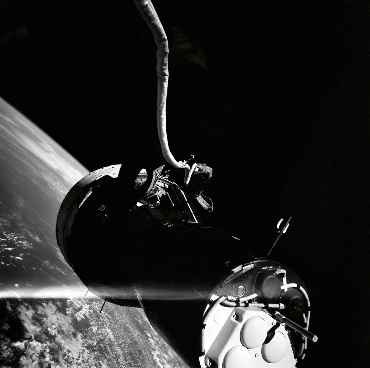 The Gemini 9 spacecraft and the umbilical cord taken by Cernan during his spacewalk. - Image Credit: NASA