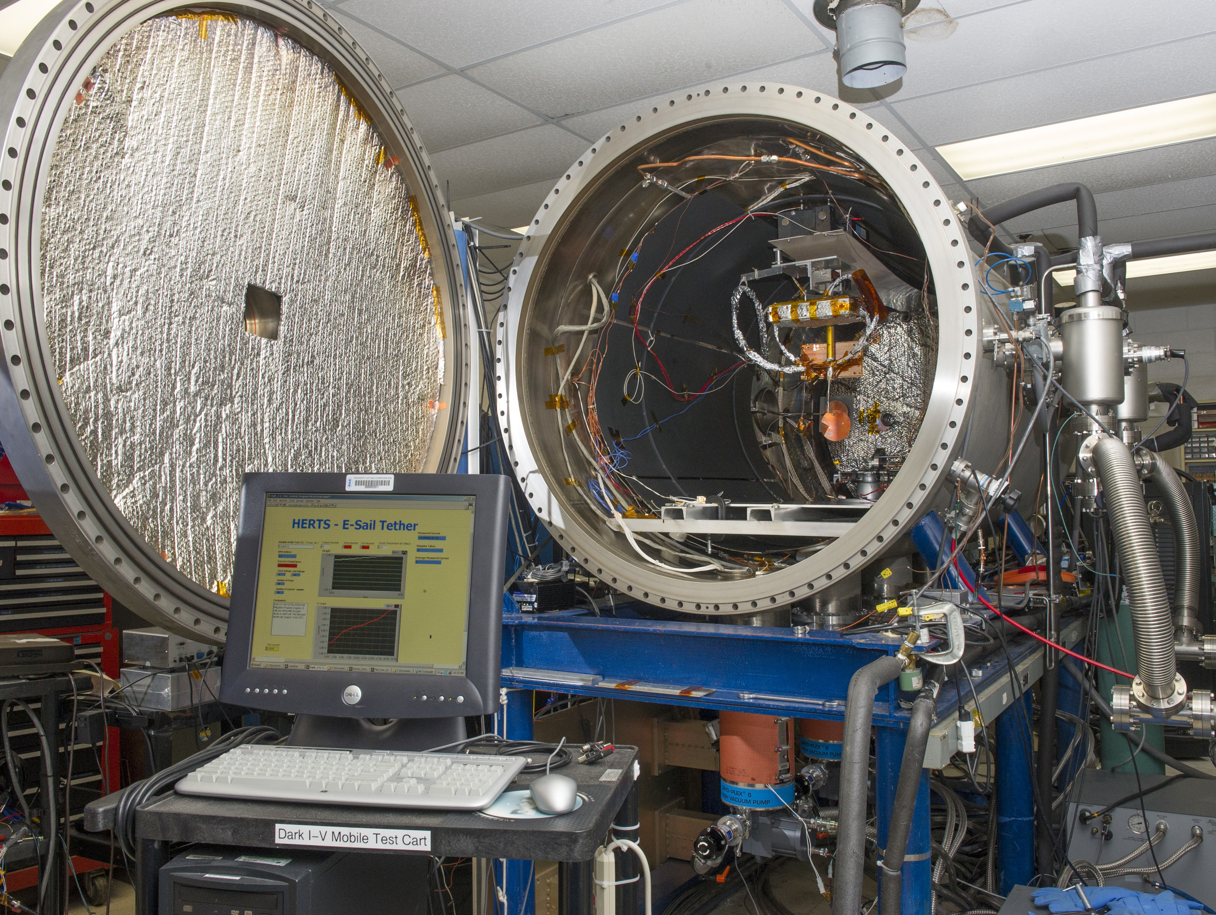 Within a controlled plasma chamber -- the High Intensity Solar Environment Test system -- tests will examine the rate of proton and electron collisions with a positively charged tether. Results will help improve modeling data that will be applied to future development of E-Sail technology concept. - Image Credits: NASA/MSFC/Emmett Given